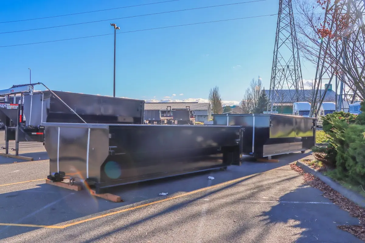 Roll-off dumpster ready for waste disposal at job site for Yard Waste Dumpster Rental in Carrboro